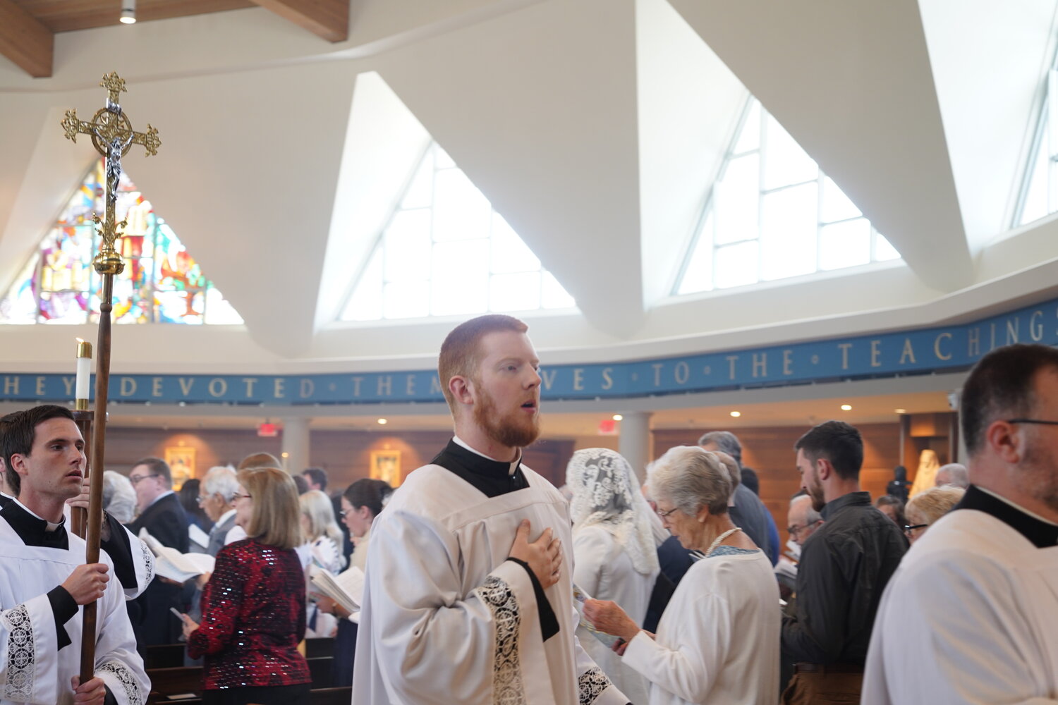 Christopher Hoffmann processes out of the Cathedral of St. Joseph with fellow seminarians on the day of the Cathedral’s Rededication Mass on May 5, 2023.